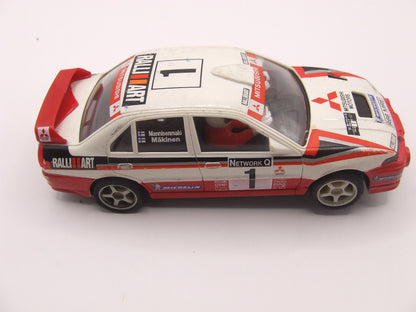 SCX Mitsubishi Lancer EVOIV #1 Mannisenmaki Makinen RalliART White on Red