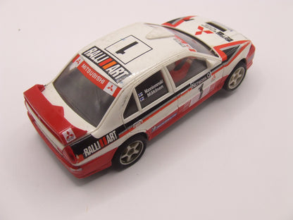 SCX Mitsubishi Lancer EVOIV #1 Mannisenmaki Makinen RalliART White on Red