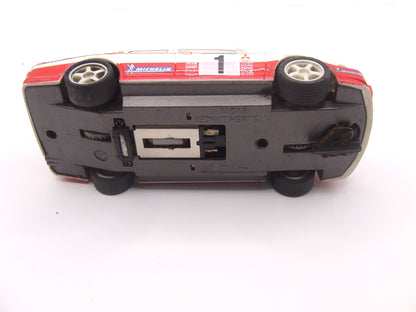 SCX Mitsubishi Lancer EVOIV #1 Mannisenmaki Makinen RalliART White on Red