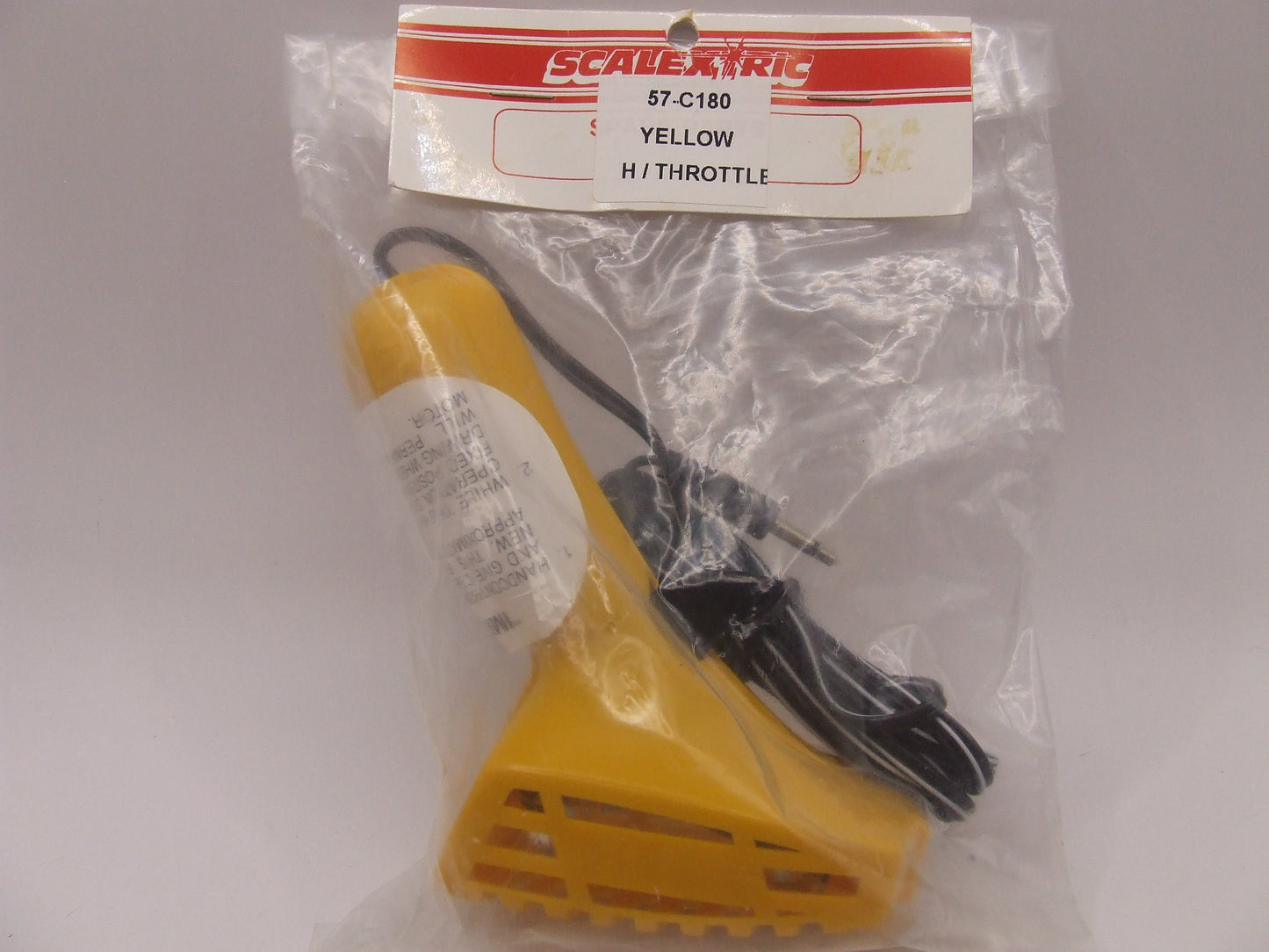 Scalextric Classic C.180 Yellow Hand Throttle new in bag never opened ex shop stock. Radio Jack plug socket.